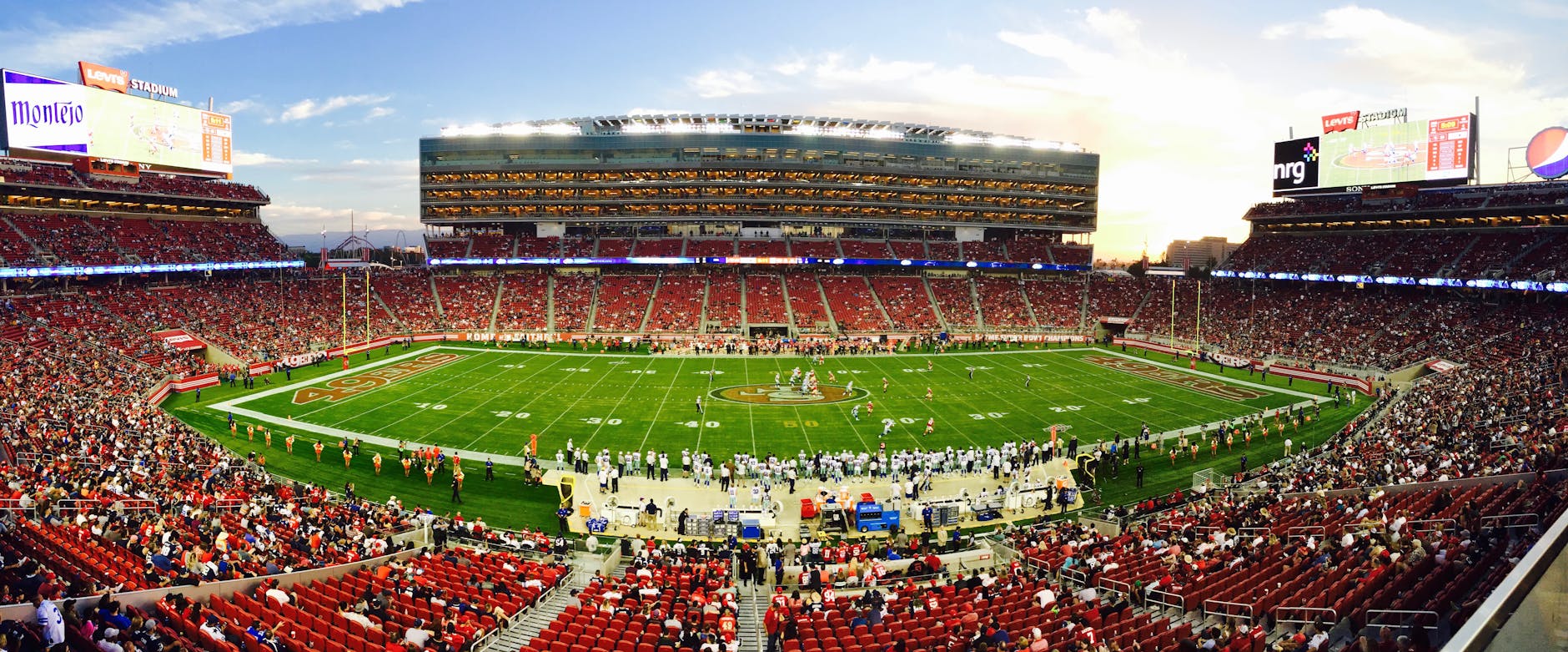 Packed football stadium during a live game - best sports betting sites