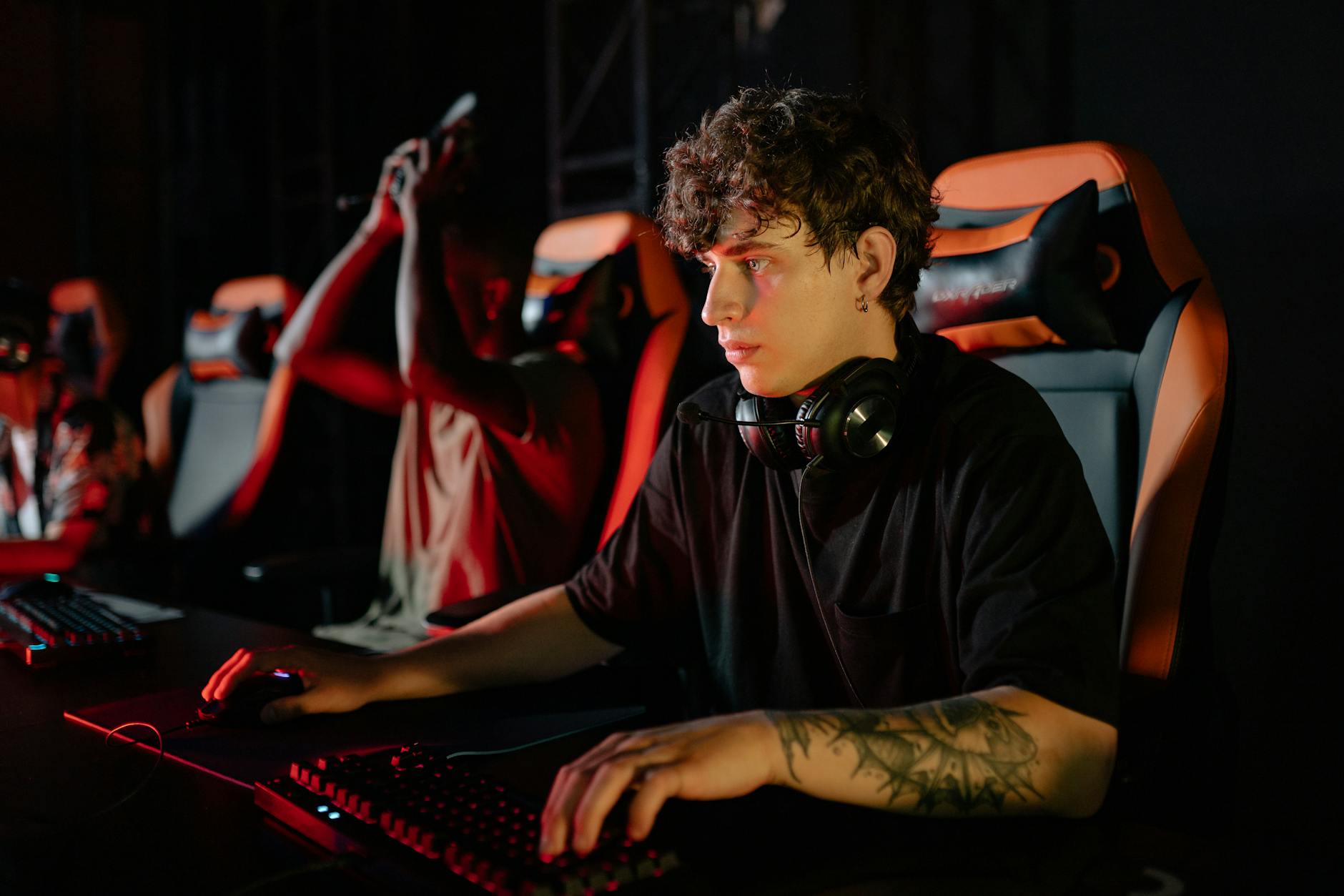 Competitive gamers concentrating during an esports betting tournament